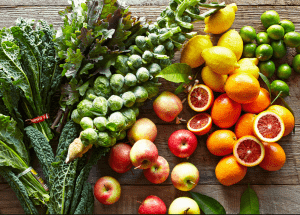 a group of fruits and vegetables on a wood surface Healthy Weight Loss Diets Poole